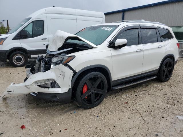Photo 1 from auction – 2018 HONDA PILOT TOUR with VIN 5FNYF5H94JB030199