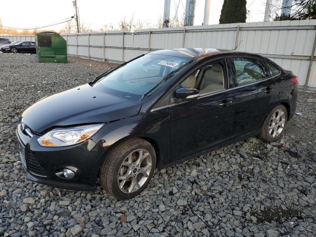 FORD FOCUS SEL 2012 with VIN 1FAHP3H21CL473081 - Photo from auction