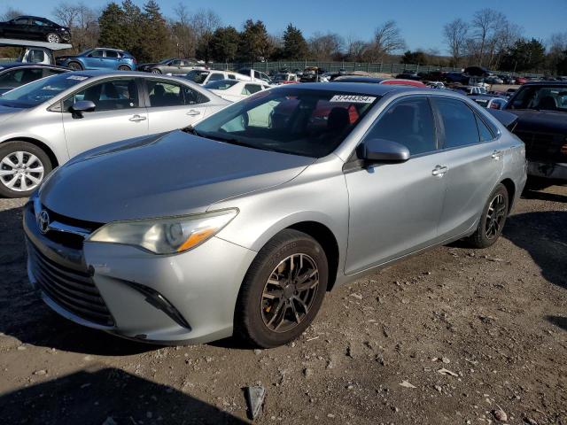 TOYOTA CAMRY LE 2015 with VIN 4T1BF1FKXFU021490 - Photo from auction
