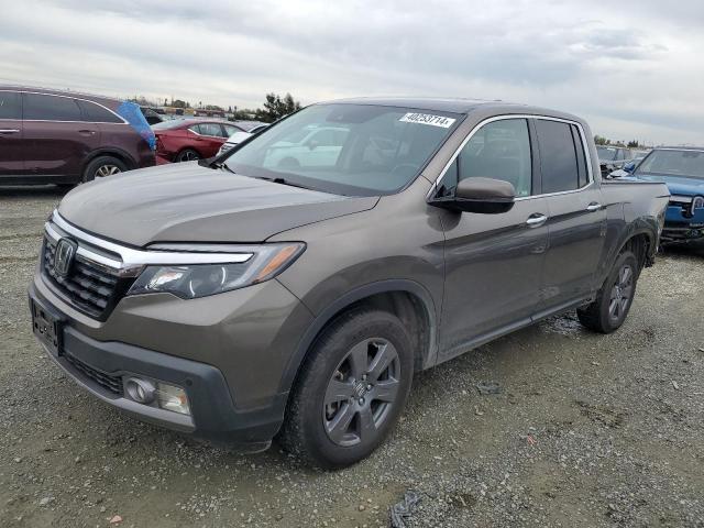 HONDA RIDGELINE 2020 with VIN 5FPYK3F74LB007100 - Photo from auction
