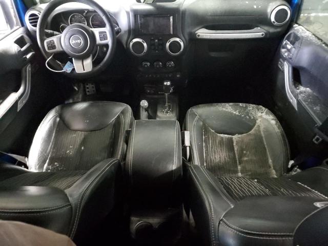 Photo 8 from auction – 2014 JEEP WRANGLER U with VIN 1C4BJWDG4EL165510