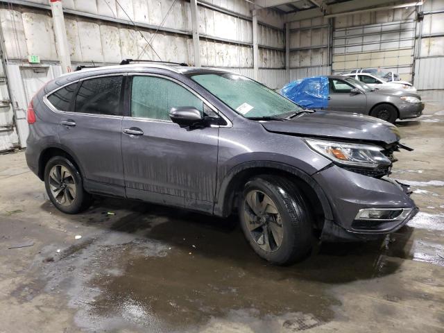 Photo 4 from auction – 2016 HONDA CR-V TOURI with VIN 5J6RM4H96GL036624