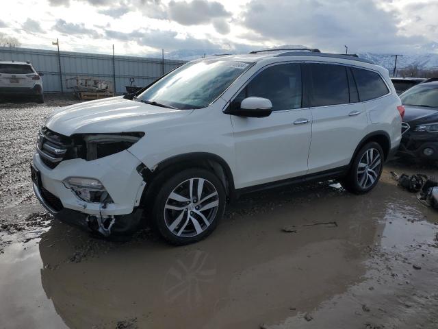 HONDA PILOT ELIT 2018 with VIN 5FNYF6H03JB054131 - Photo from auction