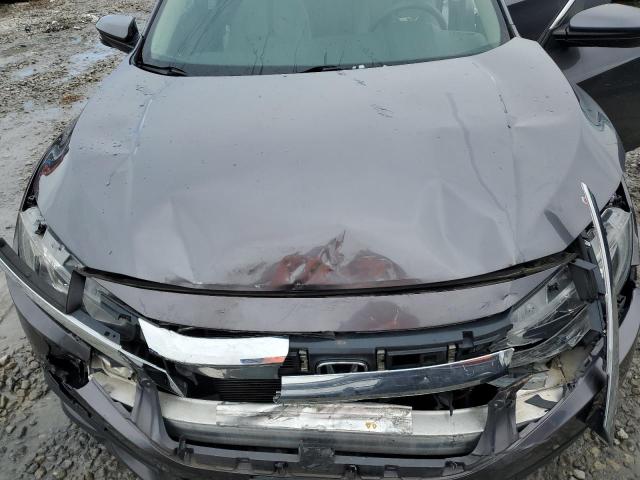 Photo 11 from auction – 2018 HONDA CIVIC EX with VIN 19XFC2F76JE024989