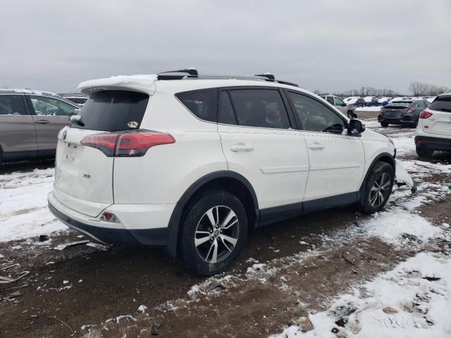 Photo 3 from auction – 2017 TOYOTA RAV4 XLE with VIN JTMWFREV3HJ713532