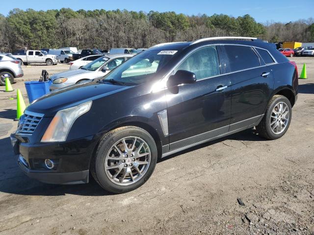 CADILLAC SRX PERFOR 2013 with VIN 3GYFNHE32DS573973 - Photo from auction