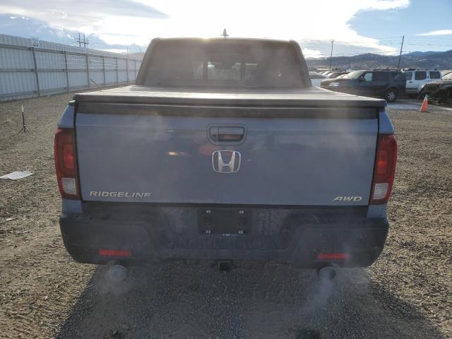 Photo 6 from auction – 2023 HONDA RIDGELINE with VIN 5FPYK3F83PB004638