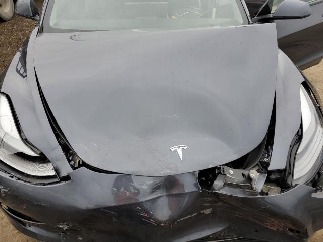 Photo 11 from auction – 2022 TESLA MODEL 3 with VIN 5YJ3E1EB4NF208096