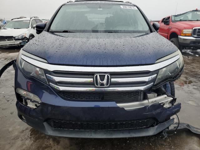 Photo 5 from auction – 2017 HONDA PILOT EXLN with VIN 5FNYF6H74HB007357