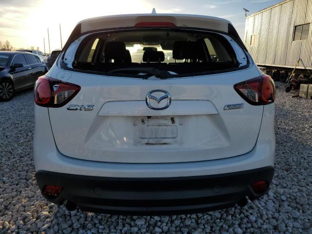 Photo 6 from auction – 2014 MAZDA CX-5 TOURI with VIN JM3KE2CY2E0338358
