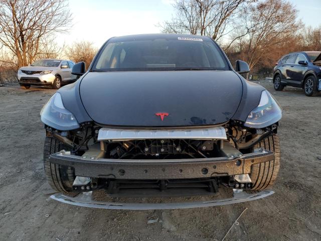 Photo 5 from auction – 2023 TESLA MODEL Y with VIN 7SAYGDEF4PF845550