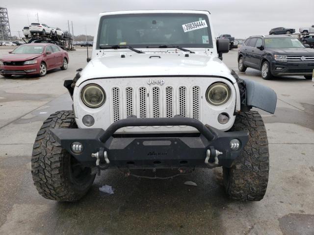 Photo 5 from auction – 2014 JEEP WRANGLER U with VIN 1C4BJWDG2EL174559