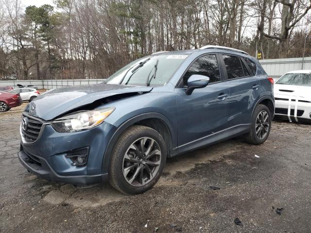 MAZDA CX-5 2016 with VIN JM3KE4DY4G0762122 - Photo from auction