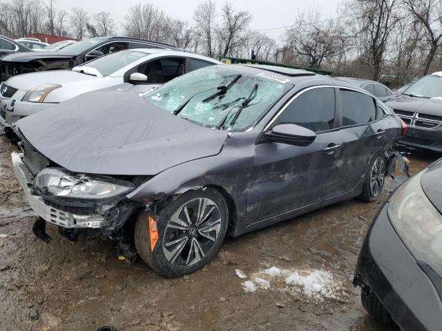 HONDA CIVIC EX 2018 with VIN 19XFC1F3XJE201616 - Photo from auction