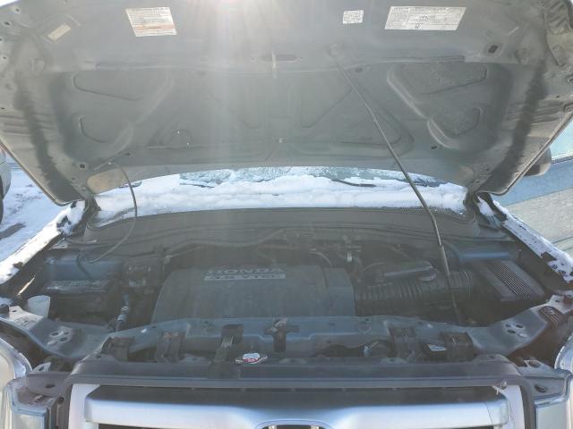 Photo 12 from auction – 2006 HONDA PILOT LX with VIN 5FNYF18176B004187