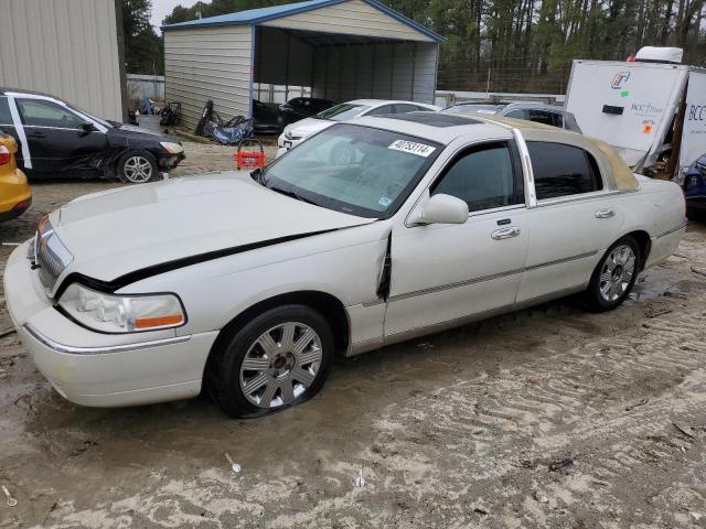 Photo 1 from auction – 2004 LINCOLN TOWN CAR U with VIN 1LNHM83W24Y677950