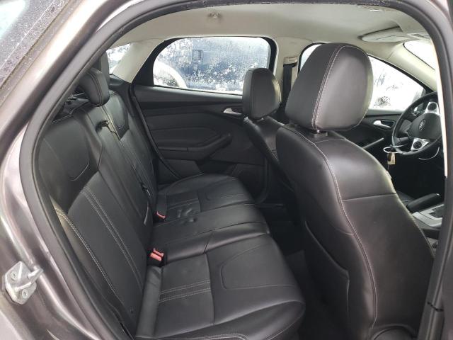 Photo 10 from auction – 2014 FORD FOCUS SE with VIN 1FADP3F21EL323959