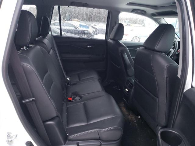 Photo 11 from auction – 2022 HONDA PILOT SE with VIN 5FNYF6H2XNB053095