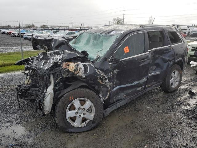 JEEP GRAND CHER 2012 with VIN 1C4RJFAG9CC134690 - Photo from auction