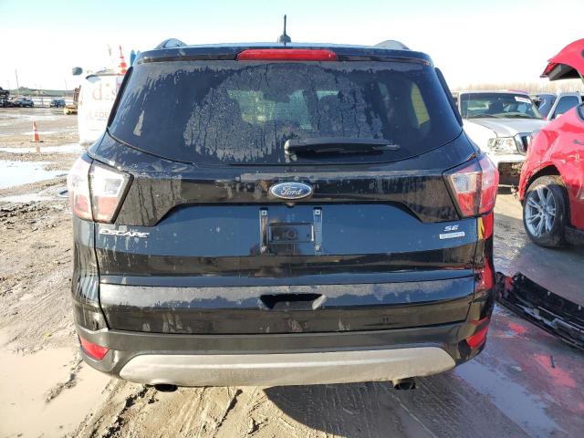 Photo 6 from auction – 2018 FORD ESCAPE SE with VIN 1FMCU0GD9JUC46058