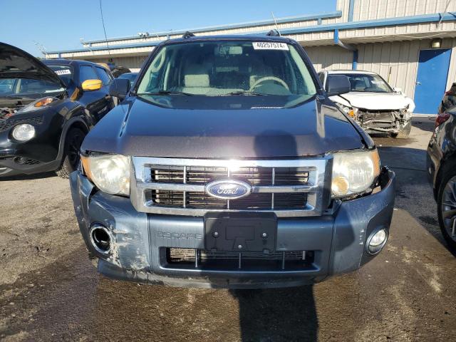 Photo 5 from auction – 2010 FORD ESCAPE XLT with VIN 1FMCU9D70AKD02533