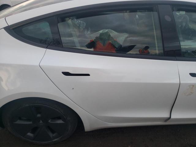 Photo 10 from auction – 2023 TESLA MODEL 3 with VIN 5YJ3E1EA2PF575878
