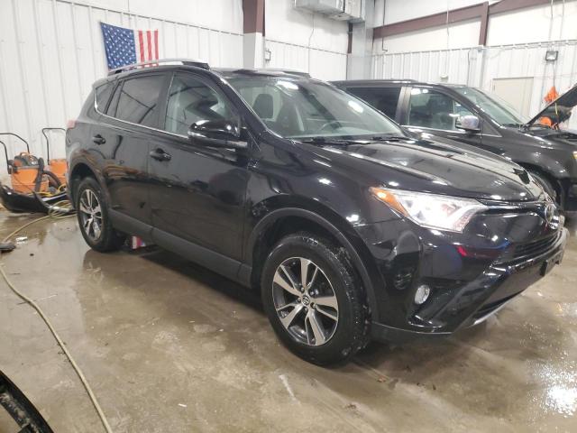 Photo 4 from auction – 2017 TOYOTA RAV4 XLE with VIN 2T3RFREV2HW578588