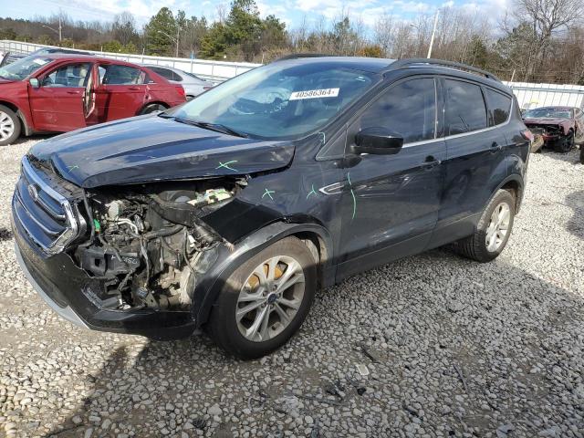 FORD ESCAPE SE 2018 with VIN 1FMCU0GD1JUD36529 - Photo from auction