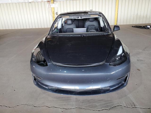 Photo 5 from auction – 2022 TESLA MODEL 3 with VIN 5YJ3E1EB7NF171917