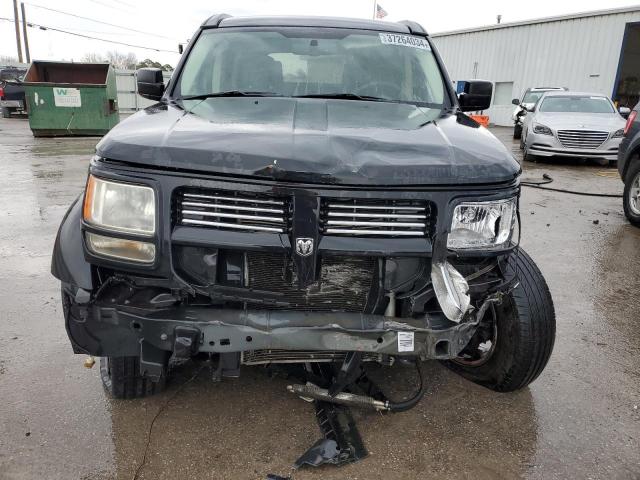 Photo 5 from auction – 2010 DODGE NITRO SXT with VIN 1D4PT5GK4AW138636