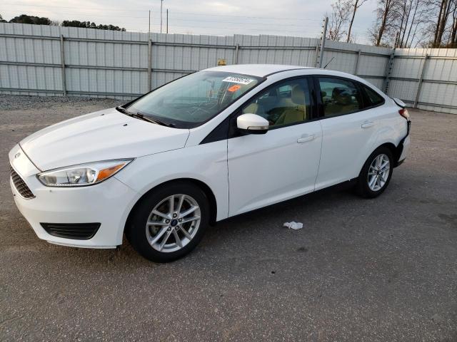 FORD FOCUS SE 2016 with VIN 1FADP3F24GL401637 - Photo from auction
