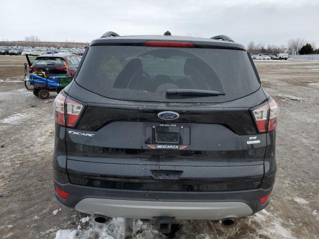 Photo 6 from auction – 2018 FORD ESCAPE SE with VIN 1FMCU0GD5JUC42542