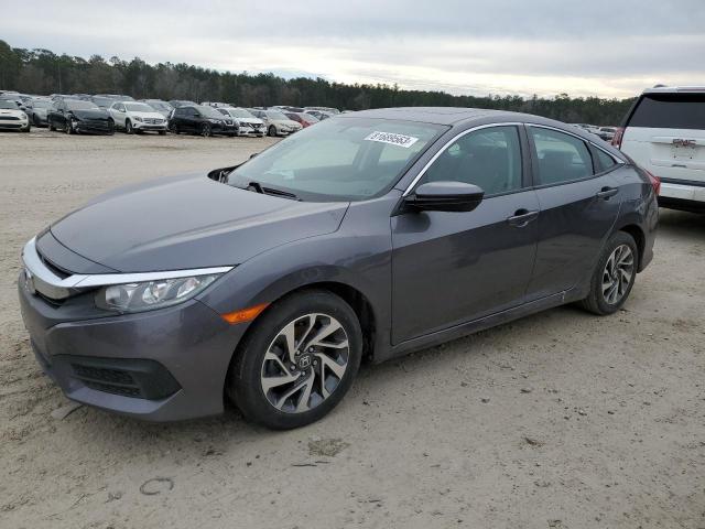 HONDA CIVIC EX 2018 with VIN 2HGFC2F7XJH537359 - Photo from auction