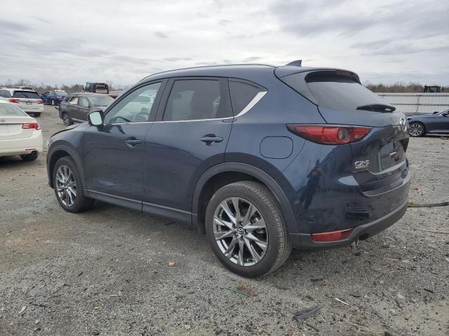 Photo 2 from auction – 2021 MAZDA CX-5 SIGNA with VIN JM3KFBEY1M0390816