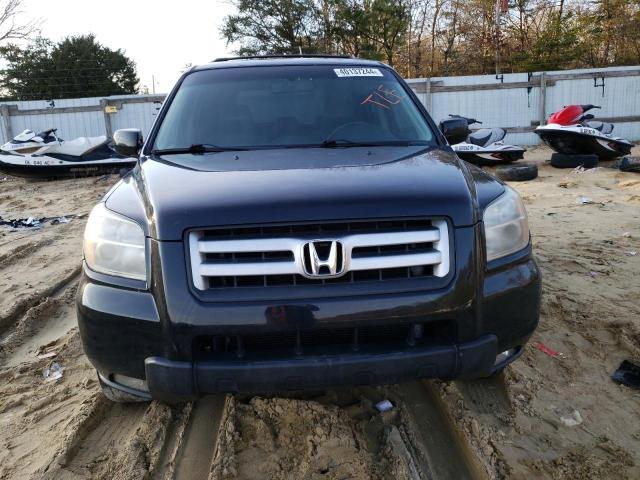 Photo 5 from auction – 2006 HONDA PILOT EX with VIN 2HKYF18586H564739