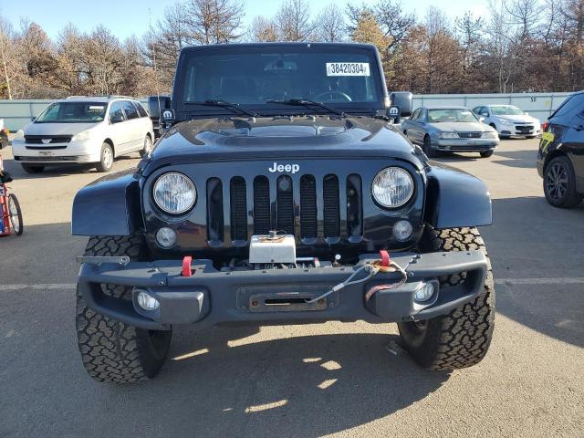 Photo 5 from auction – 2016 JEEP WRANGLER U with VIN 1C4HJWFG4GL302665