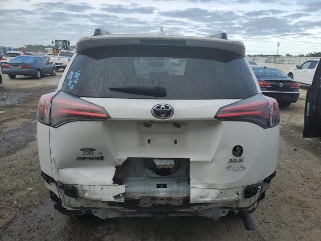 Photo 6 from auction – 2016 TOYOTA RAV4 XLE with VIN JTMWFREV8GJ072232