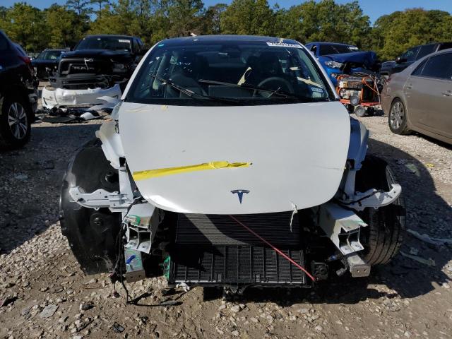 Photo 5 from auction – 2023 TESLA MODEL 3 with VIN 5YJ3E1EA4PF604068