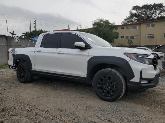 Photo 4 from auction – 2022 HONDA RIDGELINE with VIN 5FPYK3F77NB015534