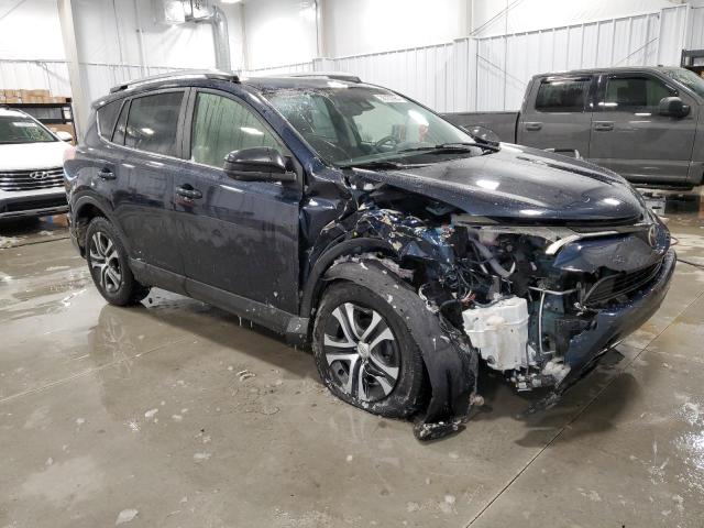 Photo 4 from auction – 2017 TOYOTA RAV4 LE with VIN JTMZFREV9HJ128208