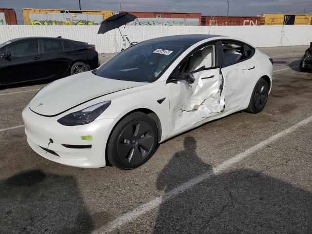 TESLA MODEL 3 2022 with VIN 5YJ3E1EA6NF322897 - Photo from auction