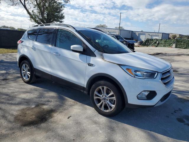 Photo 4 from auction – 2018 FORD ESCAPE SE with VIN 1FMCU9GDXJUC00520