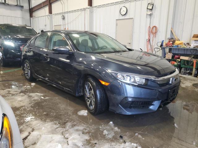 Photo 4 from auction – 2018 HONDA CIVIC EX with VIN 19XFC2F75JE033800