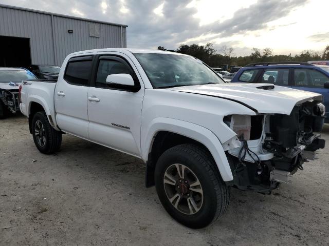 Photo 4 from auction – 2016 TOYOTA TACOMA DOU with VIN 3TMAZ5CN0GM019461
