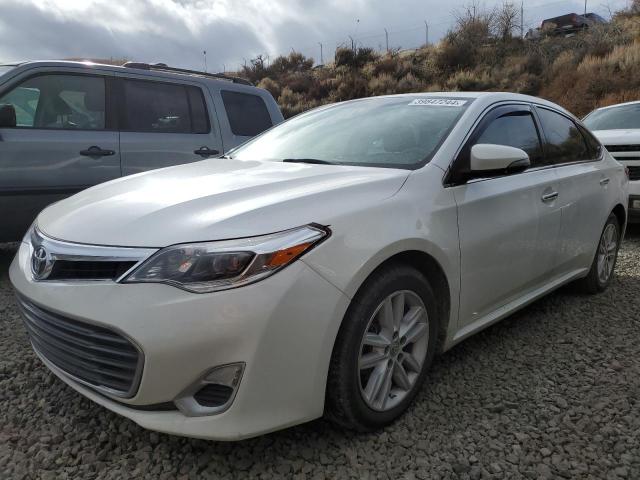 TOYOTA AVALON BAS 2014 with VIN 4T1BK1EB2EU099077 - Photo from auction