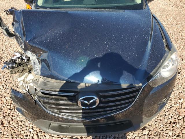 Photo 11 from auction – 2016 MAZDA CX-5 TOURI with VIN JM3KE2CYXG0906357