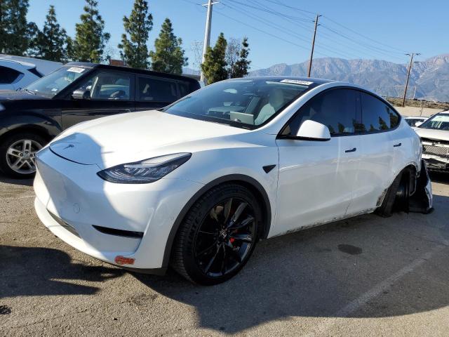 TESLA MODEL Y 2020 with VIN 5YJYGDEF1LF051774 - Photo from auction