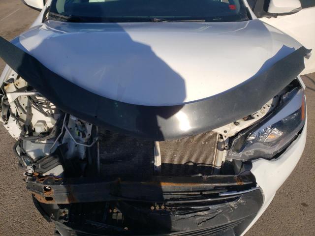 Photo 11 from auction – 2014 TOYOTA COROLLA L with VIN 2T1BURHE3EC000430