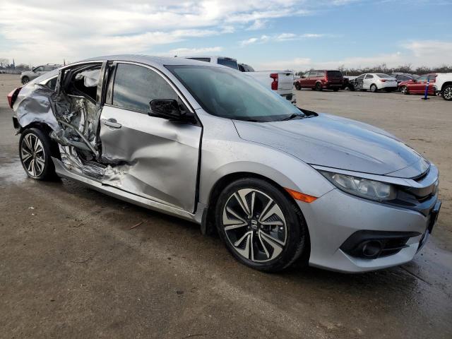 Photo 4 from auction – 2018 HONDA CIVIC EX with VIN 19XFC1F32JE201433