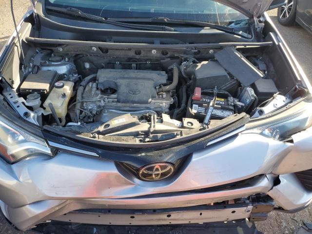 Photo 12 from auction – 2018 TOYOTA RAV4 LE with VIN JTMZFREV0JJ192241